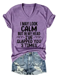 Detailed closeup view of a purple V-neck short sleeve tee with funny slogan print for women.
