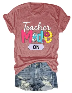 Close-up detail of red teacher mode letter print short sleeve t-shirt paired with shorts.
