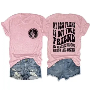 Detail view of the pink short sleeve graphic tee featuring catchy text print on front and back.