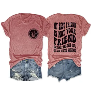 Close-up detail of red heather short sleeve t-shirt with graphic print and denim shorts.