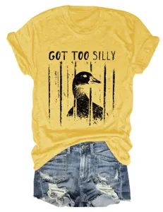 Casual women's yellow short sleeve t-shirt featuring a funny goose in cage graphic print.