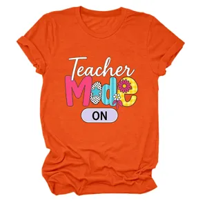 Women round neck short sleeve t shirt with teacher mode on print, casual orange top.