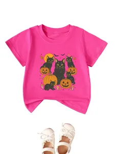 Cute kids pink short sleeve t-shirt with black cat Halloween graphic detail view.