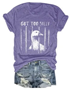 Close-up detail of the funny duck print graphic on the casual purple women short sleeve t-shirt.