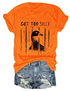 Women casual orange short sleeve T-shirt with funny duck print and denim shorts outfit.