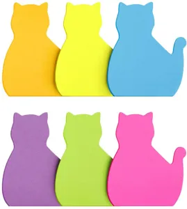 Close-up detail of colorful cat shaped sticky notes showing neat edges and vibrant colors.