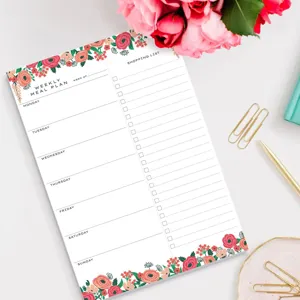 Bloc-notes de repas hebdomadaire floral à plat avec liste de courses et détails.