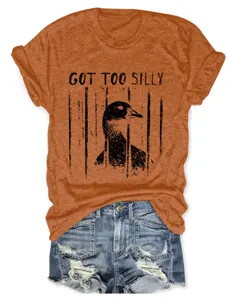 Casual women short sleeve t-shirt with funny got too silly duck graphic print and denim shorts.