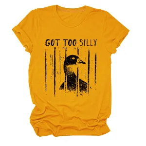 Close-up detail view showing the funny got too silly caged duck graphic on the yellow shirt.