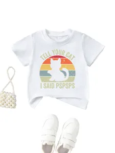 Close-up detail of white kids t-shirt featuring retro cat graphic and funny text print.