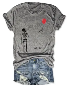Casual grey graphic t-shirt detail showing skeleton and red balloon print with funny text.
