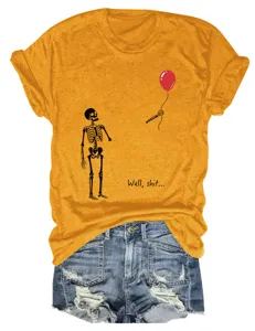 Women's casual mustard yellow short sleeve t-shirt with funny skeleton graphic and denim shorts.