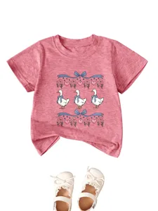 Kids pink short sleeve t-shirt featuring cute duck graphic, bow and flower print details.