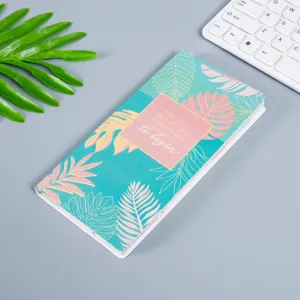 Detailed view of a cute tropical leaf pattern sticky note pad with motivational English quote.