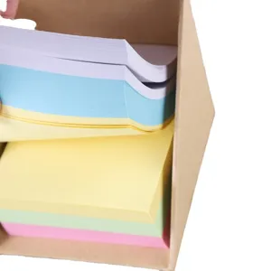 Colorful sticky notes set with kraft paper dispenser box for daily office or school use.