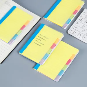 Juego de notas adhesivas portátiles con pestañas de colores y páginas rayadas fluorescentes.