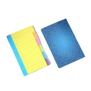 Colorful index sticky note pads and memo notebooks with lined pages for daily planning.