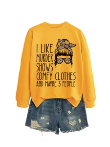 Casual women long sleeve yellow graphic sweatshirt and distressed denim shorts fashion outfit set.