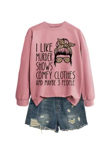 Casual pink sweatshirt featuring funny letter print and graphic, paired with denim shorts.