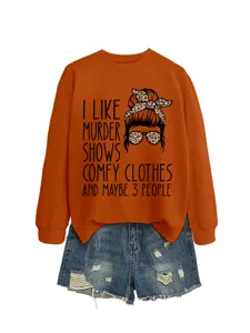 Close-up detail of the graphic print and soft fabric texture on the casual women sweatshirt.