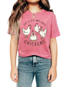 Detailed shot of the kids casual t-shirt showing cute chicken graphic and funny text.
