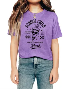 Detail view of the purple short sleeve kids t-shirt featuring fun school child graphic print.