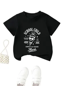 Kids black short sleeve t-shirt detail featuring school child custom graphic print design.