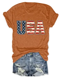 Λεπτομέρεια από casual γυναικείο κοντομάνικο t-shirt πορτοκαλί με τύπωμα USA.