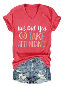 Close-up detail of the red V-neck short sleeve graphic t-shirt featuring fun print.