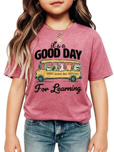 Detailed close-up view of cute school bus graphic kids short sleeve crewneck t-shirt in pink color.