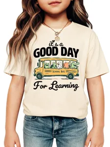 Graphic detail shot of kids short sleeve t-shirt with cute school bus animal print.