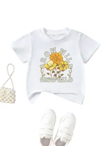 Toddler white short sleeve t-shirt with cute floral graphic and graphic text print detail.