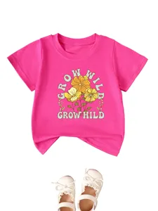 Cute pink kids short sleeve t-shirt detail showing retro floral grow wild graphic print.