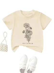 Beige short sleeve kids t-shirt with floral print and october text for casual daily wear