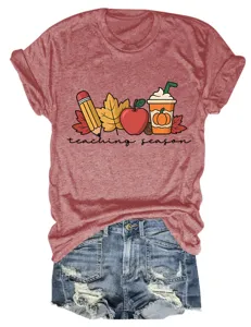 Detailed view of the cute autumn teacher season graphic print short sleeve t-shirt design.