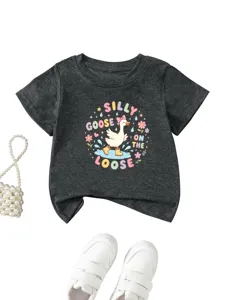 Close-up detail of the cute silly goose graphic print on the dark grey children short sleeve tee.