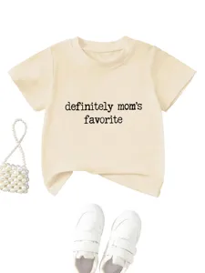 Detail view of a beige kids short sleeve t-shirt featuring fun letter print design.