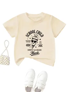 Comfortable beige short sleeve kids t-shirt with fun school cartoon print and custom name.