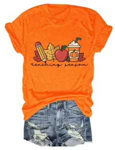 Orange short-sleeve t-shirt detail featuring cute autumn teaching season graphic print design.