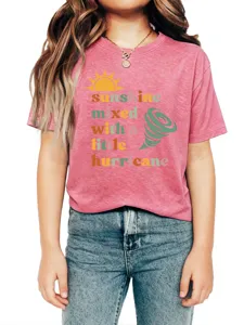 Close-up detail of casual pink short-sleeve graphic t-shirt with fun typography print.