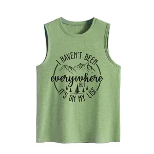 Casual women's green sleeveless tank top with inspiring mountain travel graphic print.