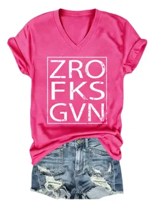 Women pink V-neck short sleeve graphic tee paired with distressed denim shorts casual style.