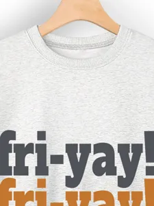 Casual grey long sleeve crewneck sweatshirt close up view with typography print detail.