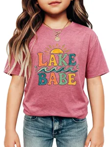 Detailed view of kids pink graphic t-shirt featuring lake babe print and soft fabric.