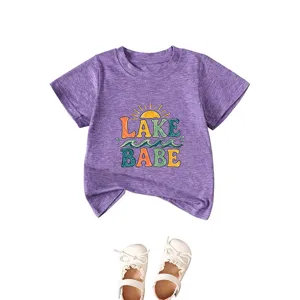 Cute purple baby short sleeve t-shirt with lake babe graphic print, comfortable toddler summer top.