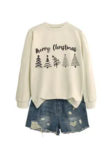 Women's Christmas sweatshirt and denim shorts outfit featuring festive tree prints.