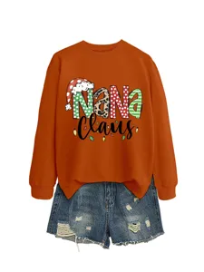 Women's orange long sleeve sweatshirt with Nana Claus Christmas print and denim shorts.