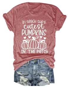 Casual women's round neck short sleeve graphic t-shirt with cute pumpkin print, brick red.
