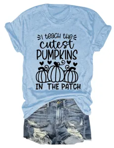 Casual light blue short sleeve women t-shirt featuring cute pumpkin graphic print details.
