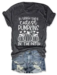 Casual women short sleeve t shirt with cute teacher pumpkin graphic print and denim shorts.